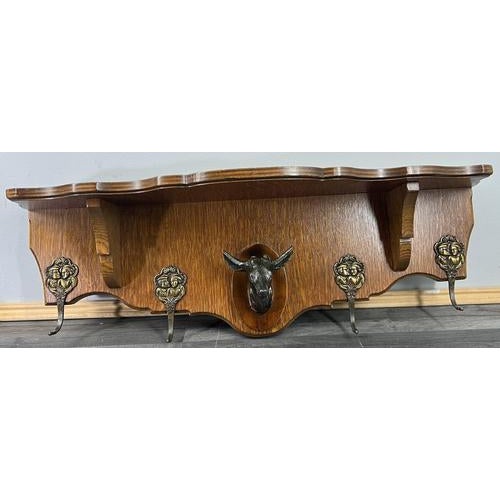 This Vintage French coat hanger is a striking and characterful wall-mounted piece, combining elegant wood form with...