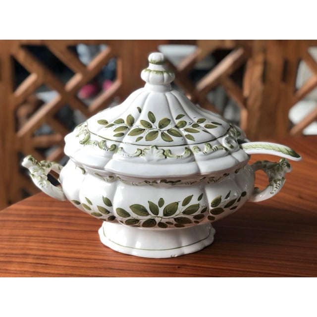 Gorgeous Italian lidded tureen with ladle hand-painted in a lovely olive green over a rich off-white glaze. Both lid and...