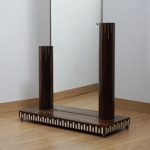 An Art Deco floor standing mirror attributed to Jaques Ruhlmann (1879-1933). Macassar Ebony with ivory inlay and original...