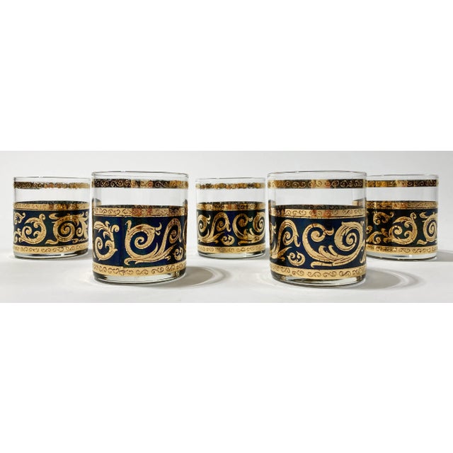 Vintage set of five Culver Ltd lowball glasses in rich black and 22K gold swirl pattern. Design is in great condition with...