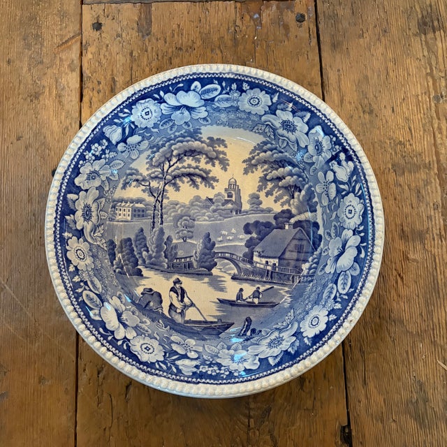 Beautiful 19th century blue and white English transferware large bowl featuring an idyllic pastoral landscape framed by a...
