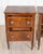 A refined pair of Tuscan bedside tables from the second half of the 18th century, beautifully veneered in walnut and...