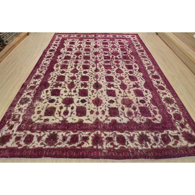 An authentic vintage traditional Overdyed Tabriz rug hand-knotted with an all-wool pile on a cotton foundation. This...