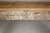 A Mughal style whitewash console table with carved apron and legs. This Mughal style whitewash console table, with its...