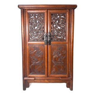 1990s Carved Hardwood Two-Door Cabinet With Plum Blossom Motifs For Sale