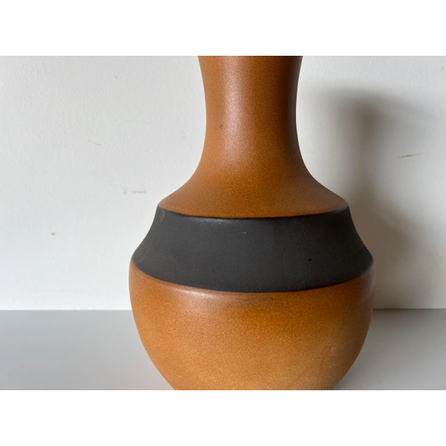Available for sale this Stunning Vintage hand thrown decorative ceramic vase covered in a wonderful organic matte brown...