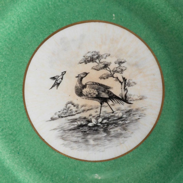 Crown Staffordshire Plates, set of 12. Intricate details of birds and trees surrounded by a green boarder. Great for...