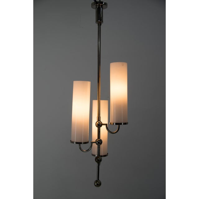 Unique 3-flamming Art Deco chandelier. Restored: nickel-plating with age patina cleaned and polished. Opaline glass...
