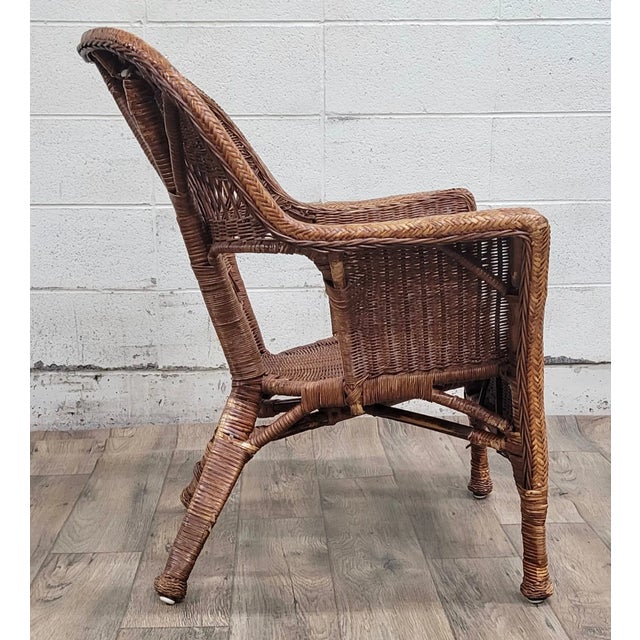 This is a gorgeous Willow style woven wicker outdoor patio or sunroom chair. Solid and sturdy, with minor cosmetic...