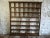 An industrial Spanish pine wall or free standing shelf with various size pigeon hole shelves. Made of solid pine it has a...