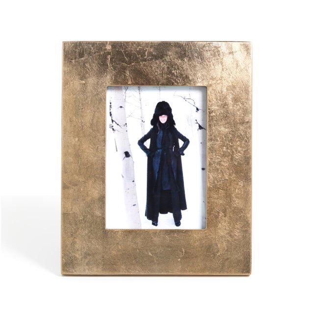 Our striking Gold Leaf Frames make the most of your memorable moments, surrounding photos in a wide border of gold foil...