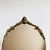 Lovely big oval mirror. Brass frame mirror in Baroque style. Italian mirror. The brass crested frame has a beautiful...