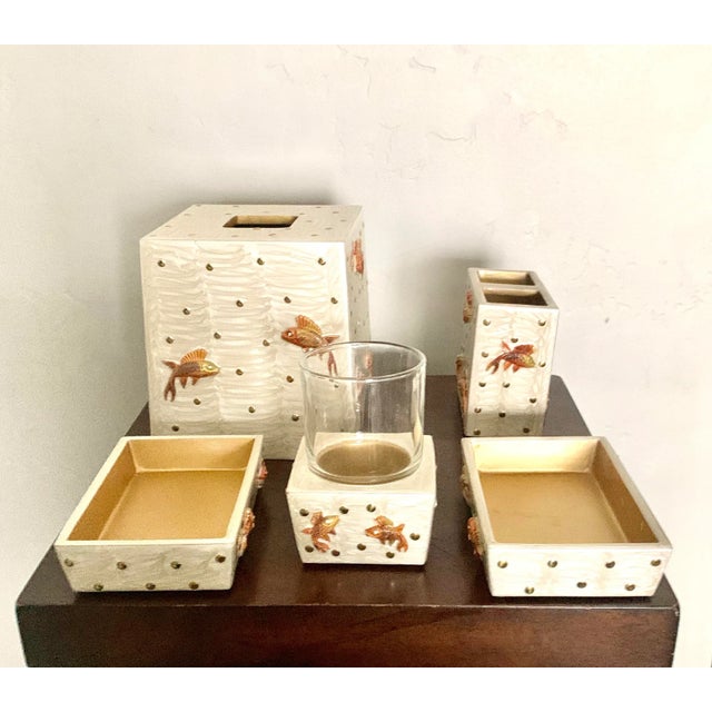 No longer in retail stores, this Mike and Alley Koi fish design bathroom set is hand enameled and decorated with crystals...