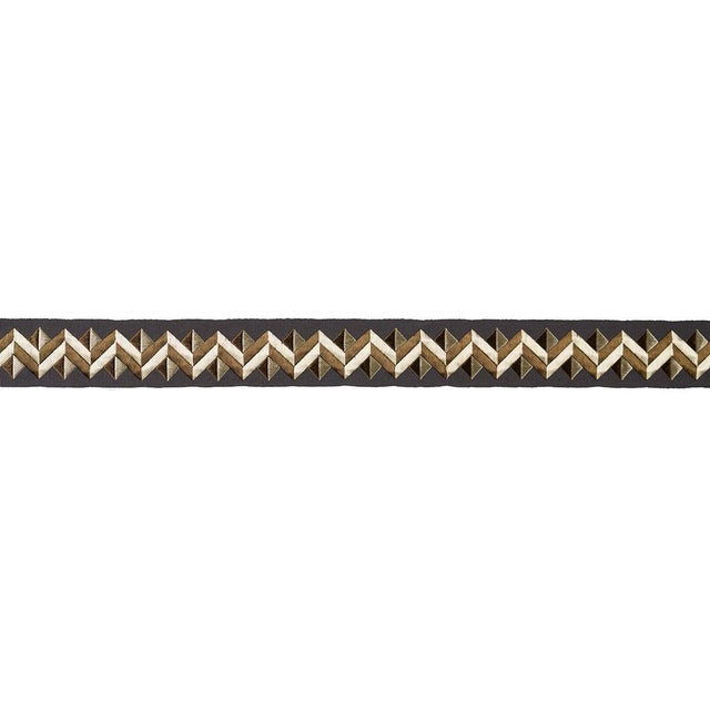 A dazzling trim with a dynamic satin-stitched pattern, Zigzag Moderne Tape adds energy and polish to pillows, upholstery,...