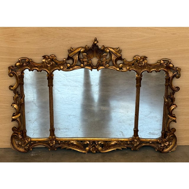 A magnificent and horizontal scale Spanish 20th century Baroque style, ormolu.