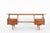 Elevate your interior with this exquisite mahogany desk by Jacques Hauville, designed in the 1950s and produced by the...