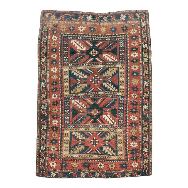 Galerie Shabab Collection Distressed Caucasian Rug With a Tribal Design in Rust, Dark Blue, and Cream For Sale