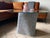 Plinth low coffee table with glass top by donatas zukauskas a sculptural bio cement coffee table with an architectural...