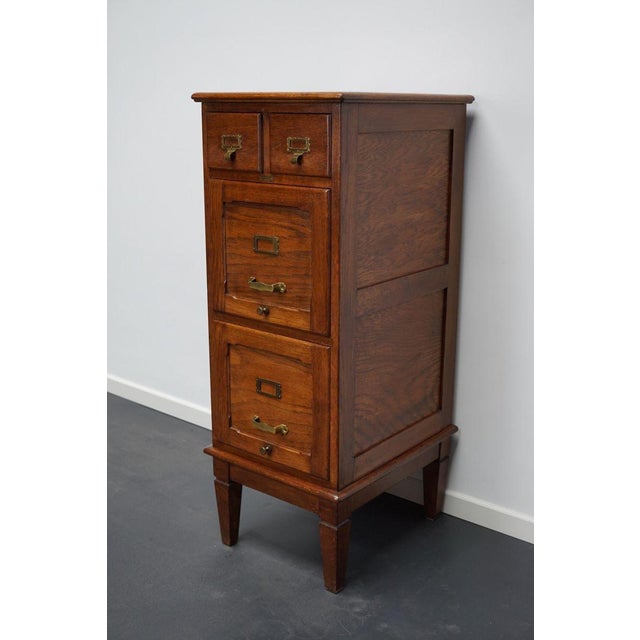 Very nice French oak filing cabinet with two small and two large drawers with brass hardware. It is very well made and in...