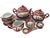 Service for four Mun Shou Longevity raspberry red porcelain luncheon/tea set, 28 pieces. This set is hand painted in the...