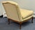 Elegant Ralph Lauren accent chair with classic French-inspired styling. The warm brown wood frame features intricate...