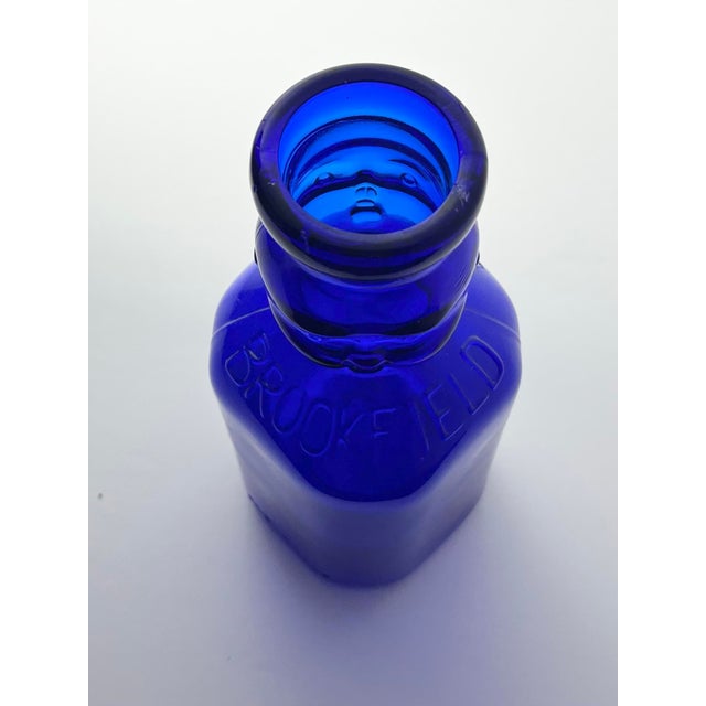 1930s Vintage Brookfield “Baby Top, Face” Cobalt Blue Glass Bottle For Sale - Image 10 of 11