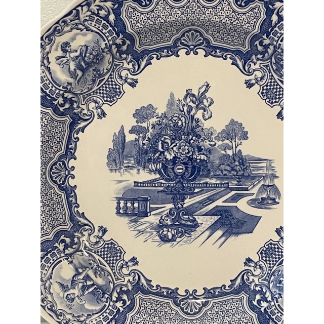 Blue and white Spode Plate. Original design, “Seasons” introduced in 1837. Central transferware design with a floral...