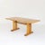 Ash wood dining table produced in the 1980s by the company T70. It shows light signs of use.