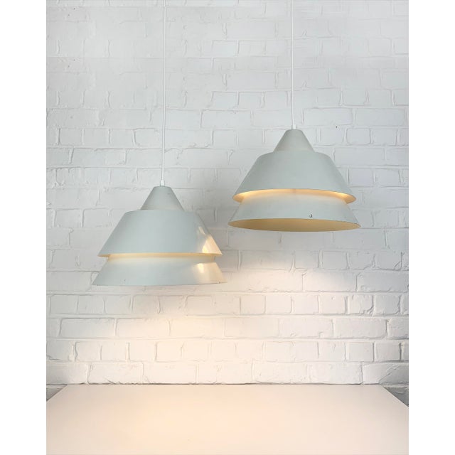 Pair of Modernist Zone pendant lamps in light grey. Design by Jo Hammerborg for Fog & Mørup, Denmark, 1960s. The lamps...