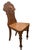 An exquisite 19th-century Victorian hall chair crafted from solid oak, featuring striking Gothic Revival architectural...