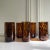 Lovely set of six tortoise shell print highball glasses/tumblers in shades of amber and brown. Made in Italy. Brand new,...