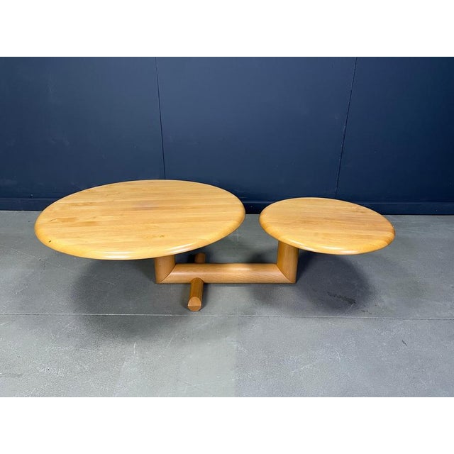 Rare wooden coffee table with two pivoting table tops by roche Bobois. Beautiful post modern design, which is also very...