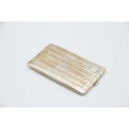 Rectangular Silver Cigarette Case with Engraved Strips, in Very Good conditions. Designed 1890 to 1919 This piece has an...