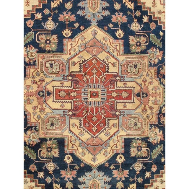 The Serapi Collection reinterprets traditional tribal geometric design through a refined palette. Each rug is hand-knotted...