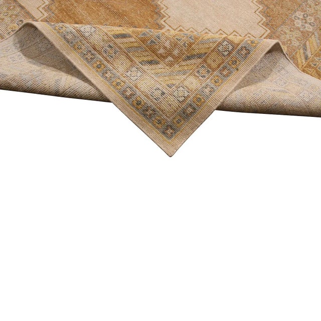 This 6x9 rug design is an exciting new addition to the Homage Collection by Rug & Kilim—an encyclopedia of styles...