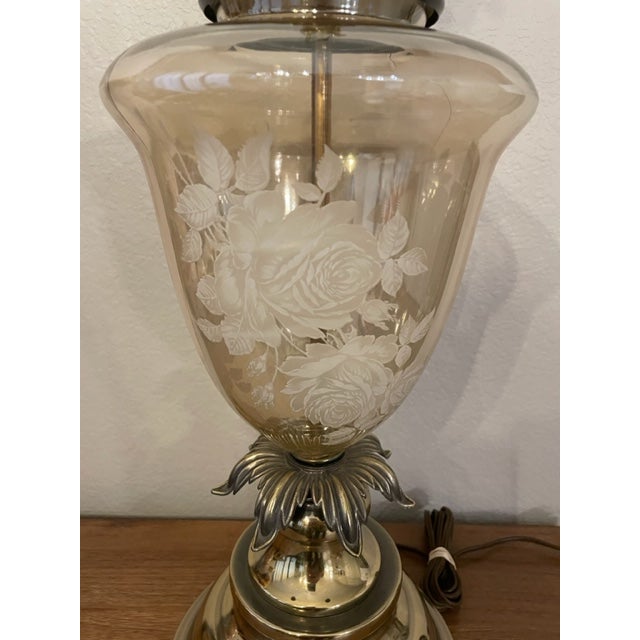 This looks like a Carl Falkenstein Mid century (50-60 yr old) floral vintage table lamp with hand painted details. It...