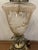 This looks like a Carl Falkenstein Mid century (50-60 yr old) floral vintage table lamp with hand painted details. It...