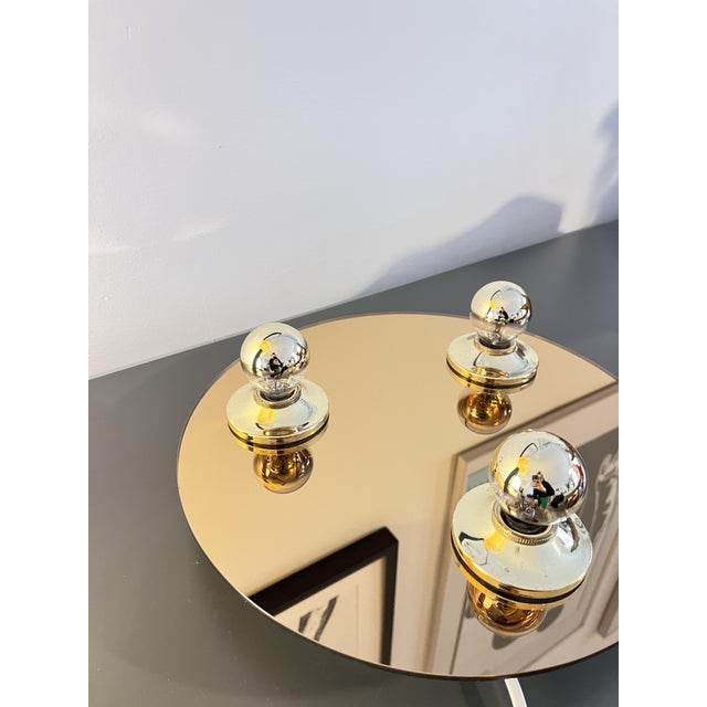 Original vintage pop up wall lamp by EGLO Light, made in Germany in the 1980s. The mirrored surface helps the light...