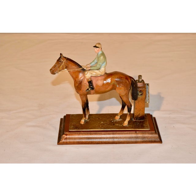 19th century jockey striker from England made from polychromed spelter. It is a lovely model of a mounted jockey on...