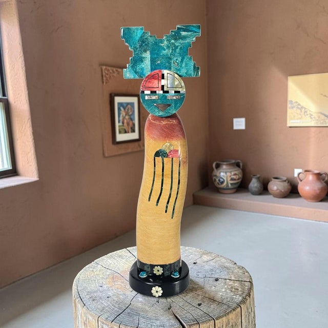 A large-scale kachina-form sculpture by Pedro Jimenez III, a Peruvian-born artist known for producing figures in stone and...