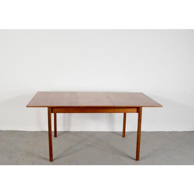 Mid-Century Modern Extendable Teak Dining Table from McIntosh, 1960s, in Very Good conditions. Designed 1960 to 1969 I...