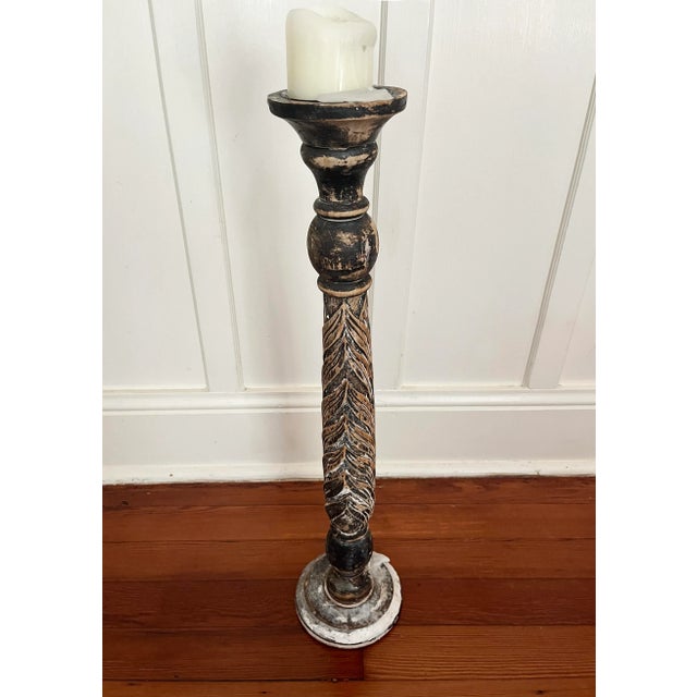 19th Century hand-carved wooden floor candlestick holder, likely salvaged from a European church. This Gothic stand...