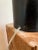 This sculptural lamp is a sure statement maker and collector's piece. Artisan-made Atollo style lamp in custom black...