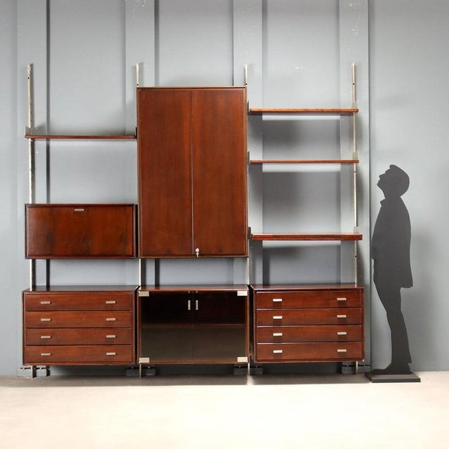 Bookshelf designed by Gianni Moscatelli for Formanova in the 1970s, featuring a modular design with wall anchoring for...