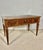 Elegant early 20th century walnut writing desk in the Louis XVI taste, featuring refined neoclassical lines and beautiful...