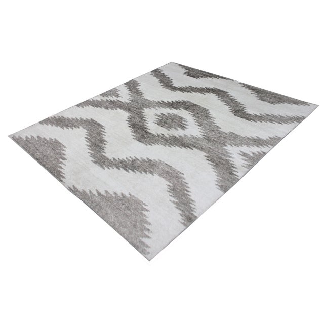 A beautiful handmade Bamboo rug. The geometric design woven in by Aara Rug hands. This rug is made of 75% bamboo silk and...