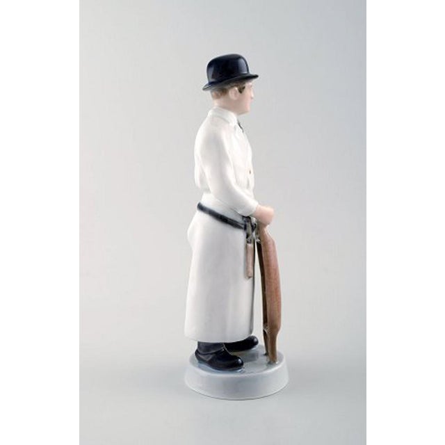 Royal Copenhagen, Butcher designed by M. Bovenschulte. Measures: 20 cm. First factory quality, in perfect condition. Model...