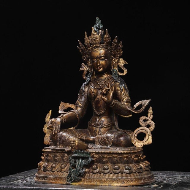 This is a substantial, finely detailed vintage Tibetan Buddhist statue of Green Tara (Sgrol-ma). Crafted from copper with...
