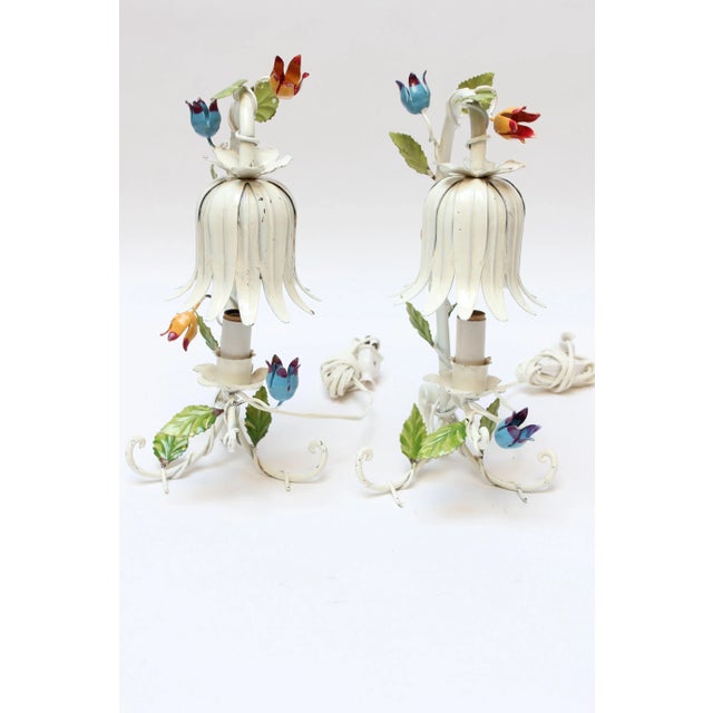 Pair of diminutive Florentine toleware table lamps (ca. 1950, Italy). Composed of white enameled metal with colorful...