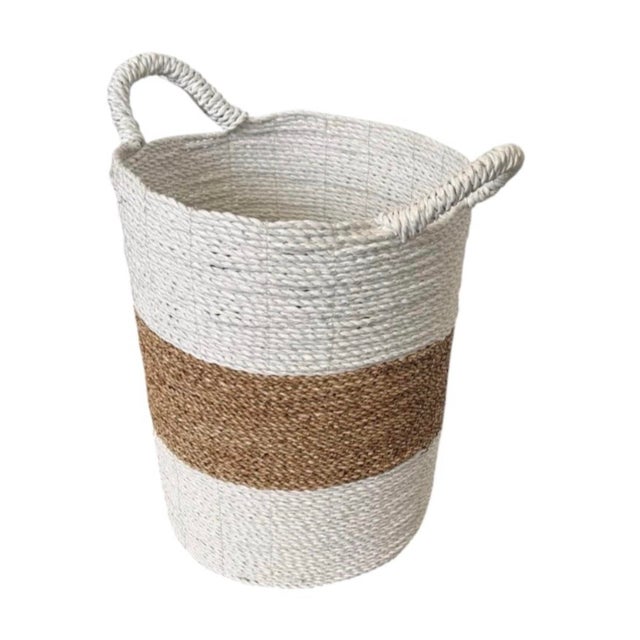 Elevate your space with this charming vintage woven storage basket, featuring a crisp coastal two-tone design. Handcrafted...